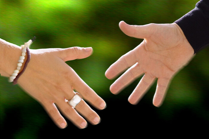 Körpersprache Gesten Hand Hände Händedruck Mann Frau / Foto: TELOS - 15175g